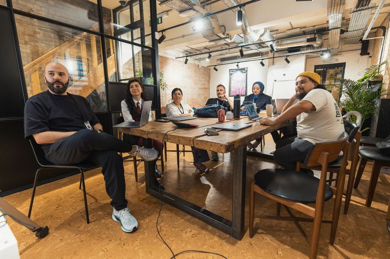 A team in a meeting around a table